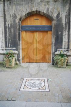 Royalty Free Photo of the Entrance of St Michaels Tower in Gloucester, United Kingdom