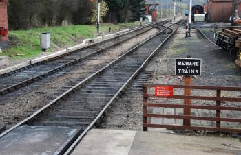 Royalty Free Photo of a Beware of Trains Sign in Winchcombe, Gloucestershire