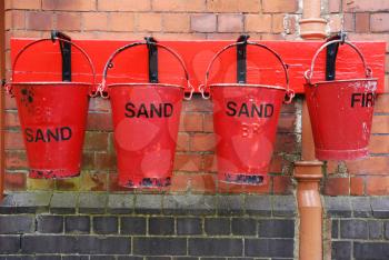 Royalty Free Photo of Four Antique Fire Buckets