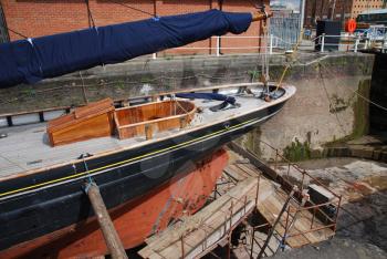 Royalty Free Photo of an Antique Boat Reparation at Dry Docks