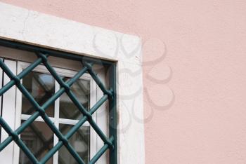 Royalty Free Photo of a Window With Security Bars
