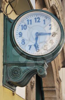 Royalty Free Photo of an Antique Wall Clock