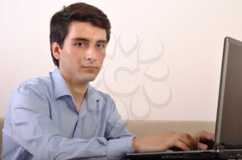 Royalty Free Photo of a Man on a Laptop