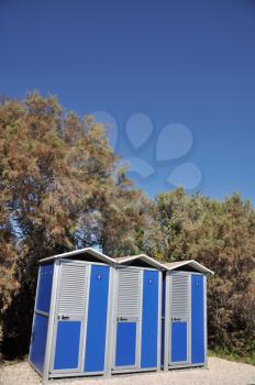 Royalty Free Photo of Blue Portable Toilets