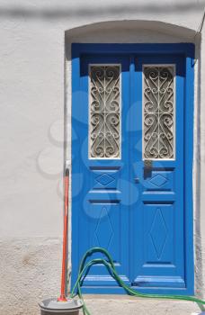 Royalty Free Photo of a Traditional Blue Greek Door in Kalymnos Island, Greece