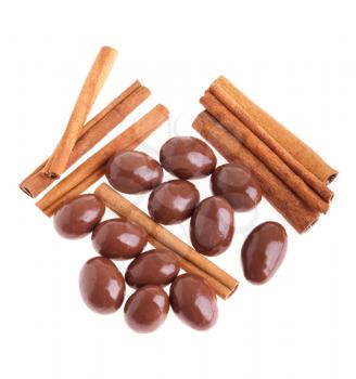 Royalty Free Photo of Chocolate Almonds and Cinnamon Sticks