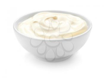 Tasty sauce in bowl on white background�