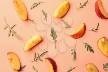 Composition with fresh sliced peaches on color background, top view�