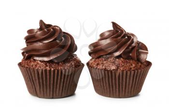 Tasty chocolate cupcakes on white background�