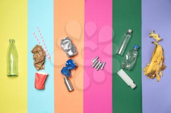 Different garbage on color background�