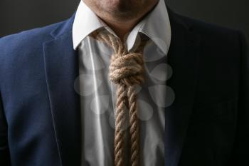 Man with noose around neck, closeup. Suicide awareness concept�