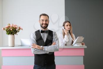 Portrait of male receptionist in hotel�