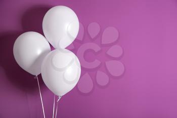 Balloons on color background�