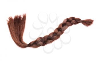 Braided strand on white background. Concept of hair donation�