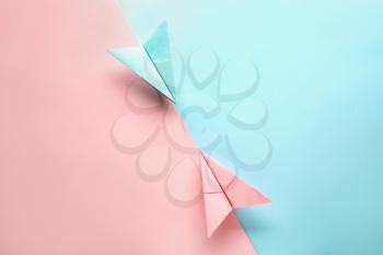 Paper planes on color background. Travel concept�
