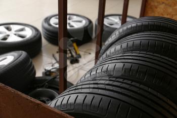 Car tires in automobile service center, closeup�