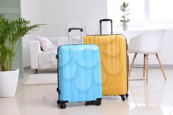 Packed suitcases in room�