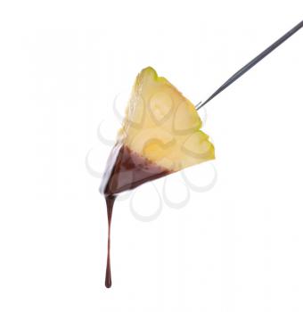 Fondue stick with chocolate covered pineapple on white background�
