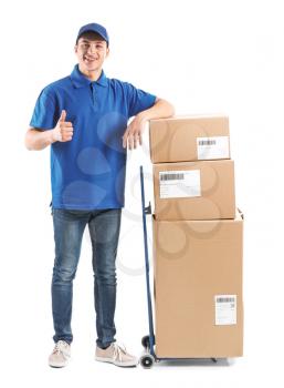 Delivery man with boxes showing thumb-up on white background�