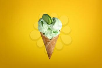 Tasty ice cream on color background�