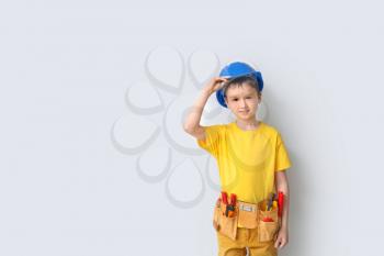 Cute little worker on white background�