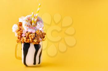 Delicious freak shake on color background�