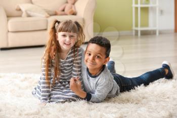 Cute adopted children in their new home�