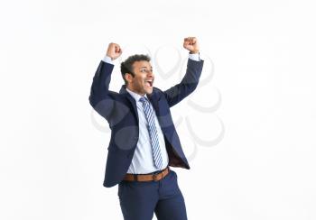 Happy successful businessman on white background�