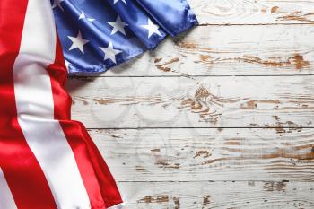 Flag of the United States of America on wooden background. Independence Day celebration�