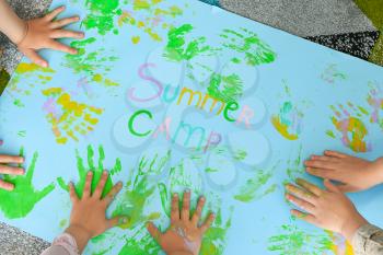 Little children during art lesson in summer camp�
