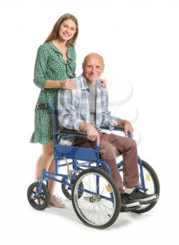 Handicapped elderly man with daughter on white background�