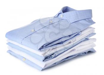 Stack of clean clothes on white background�