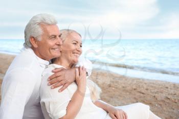 Happy mature couple at sea resort�