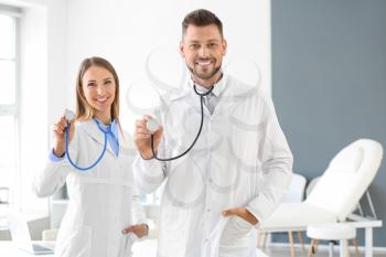 Doctors with stethoscopes in clinic�