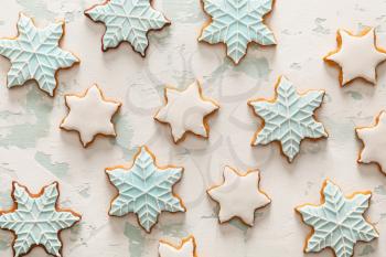Tasty Christmas cookies on light background�