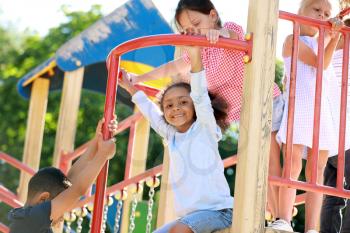 Cute little children on playground outdoors�