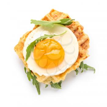 Tasty squash waffles with fried egg on white background�