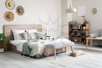 Stylish interior of comfortable bedroom�