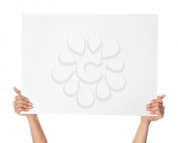 Female hands with blank poster on white background�