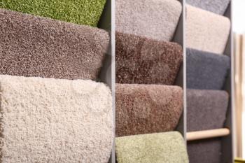 Different samples of carpets in shop�