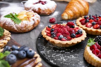 Assortment of sweet pastry on table�
