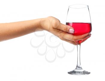 Female hand with glass of wine on white background�