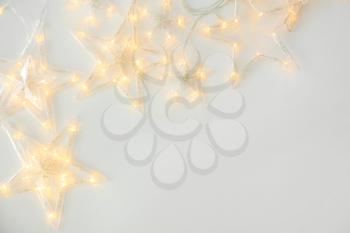 Beautiful glowing garland on white background�
