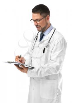 Portrait of male doctor with clipboard on white background�