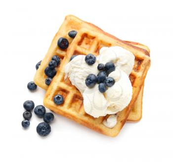 Tasty waffles with berries and ice-cream on white background�