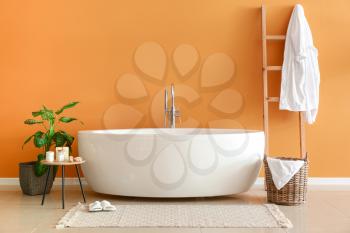 Modern bathtub in stylish interior�