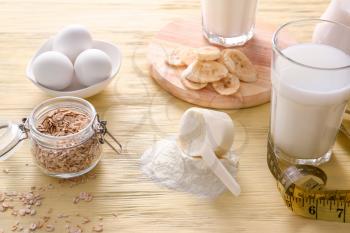 Protein powder with products on table�