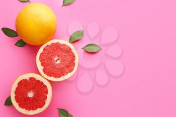 Fresh grapefruits on color background�