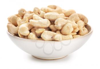 Bowl with cashew nuts on white background�