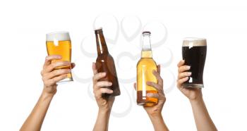 Hands with beer on white background�
